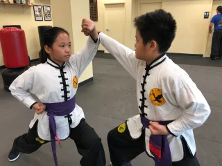 KIDS MARTIAL ARTS PRACTICE INSTILLS STRONG COMMITMENT SKILLS FOR SCHOOL &amp; LIFE-LONG SUCCESS